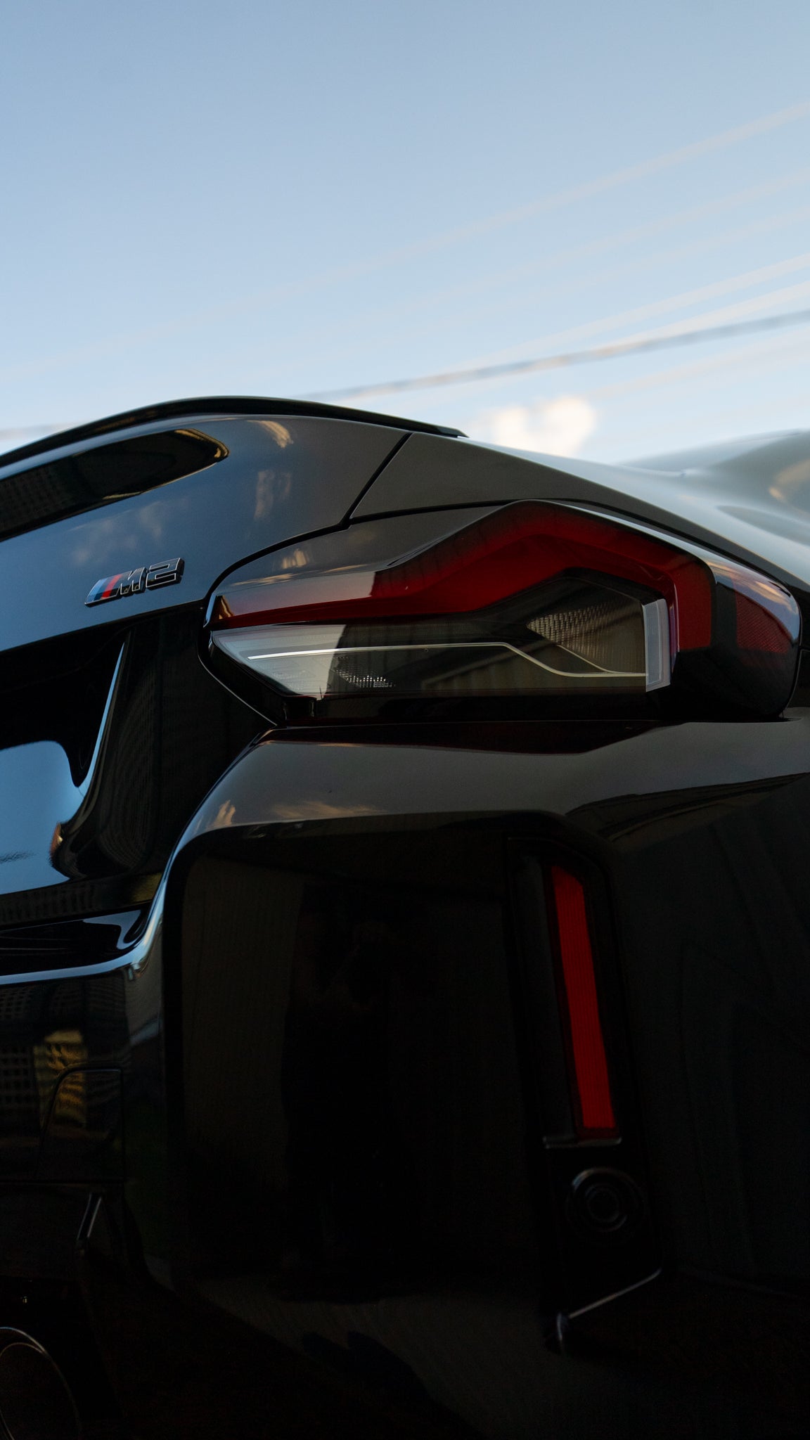 Close-up of a car's rear light with a blurred background